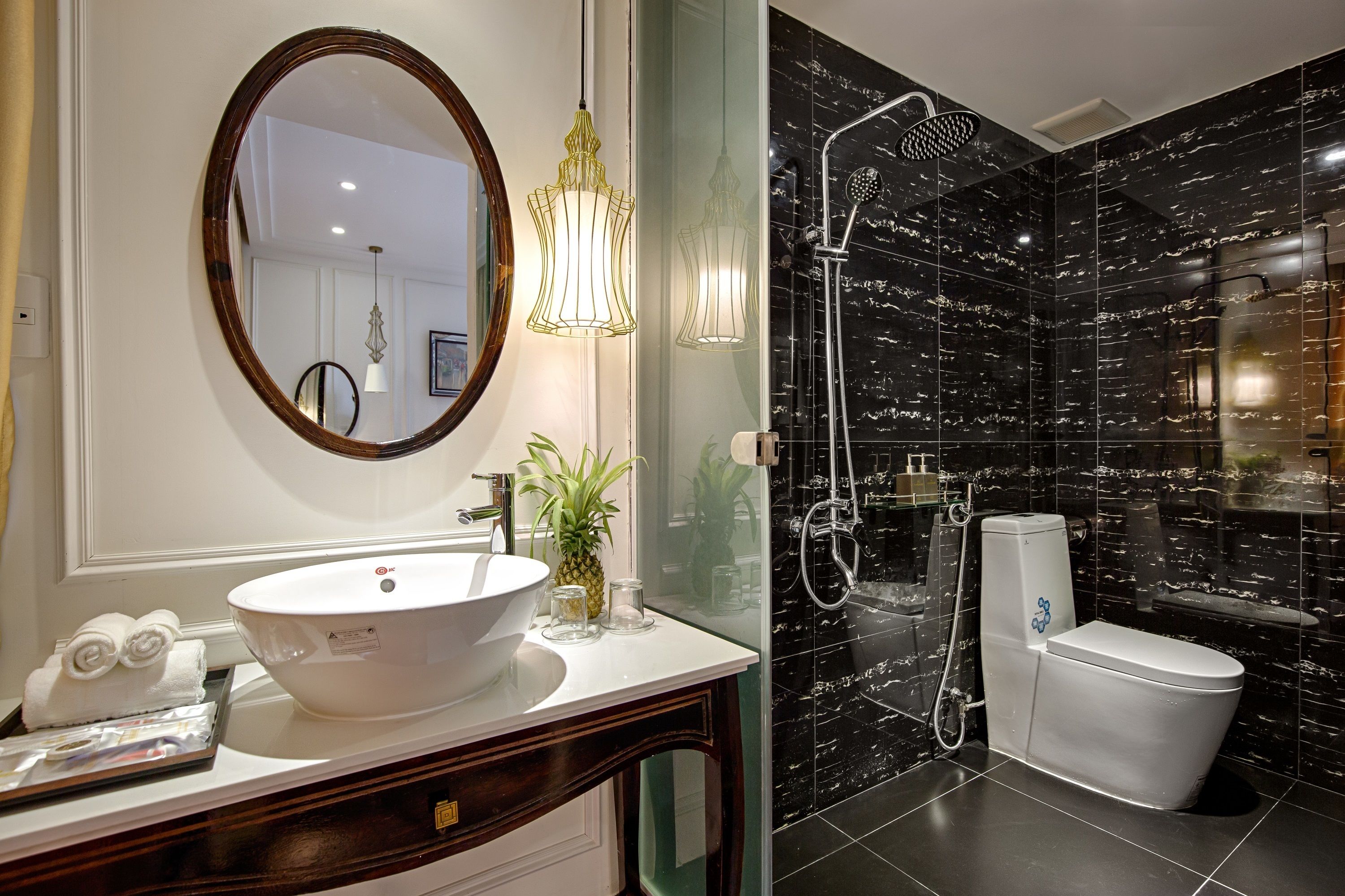 deluxe apartment | bathroom | shower, free toiletries, hair dryer, slippers