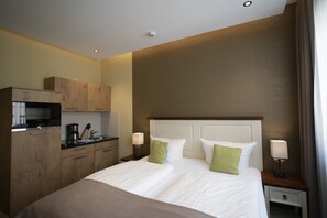 Studio | Hypo-allergenic bedding, memory-foam beds, desk, laptop workspace