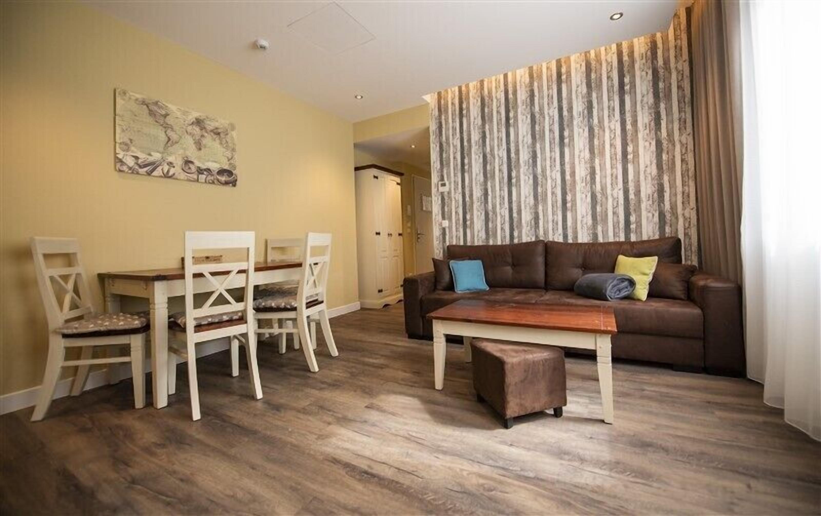 Apartment, 2 Bedrooms | Private kitchen | Full-size fridge, microwave, stovetop, coffee/tea maker