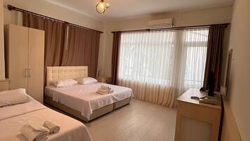 Comfort Triple Room | Free minibar, desk, laptop workspace, iron/ironing board