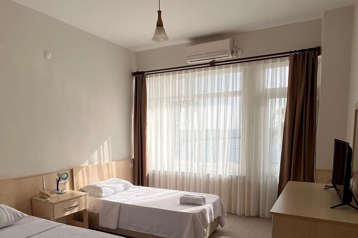 Classic Twin Room | Free minibar, desk, laptop workspace, iron/ironing board