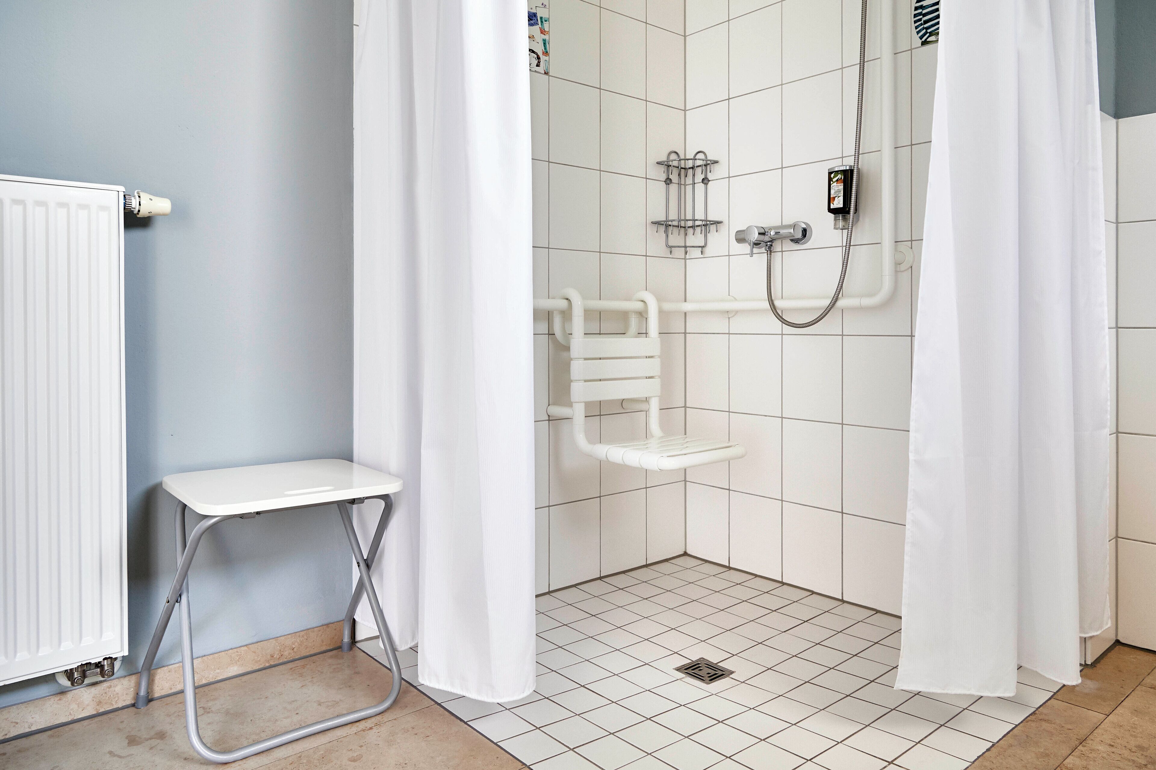 city apartment, mobility accessible | bathroom | shower, free toiletries, hair dryer, towels