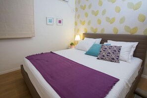 Apartamento luxo, 2 quartos | Escrivaninha, ferros/tábuas de passar roupa, berços (sobretaxa)