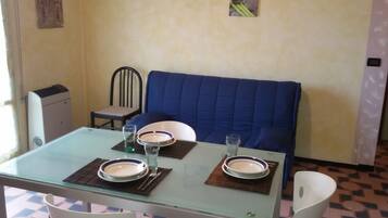 Apartment, 1 Bedroom | Living area | TV