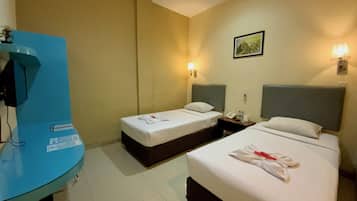 Kamar Deluks | Meja kerja, tirai kedap cahaya, Wi-Fi gratis, dan seprai linen