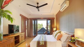 A hotel room with a bed, bedside table, TV, and a view of the outside. - The Hotman Paris II Seminyak (Seminyak)