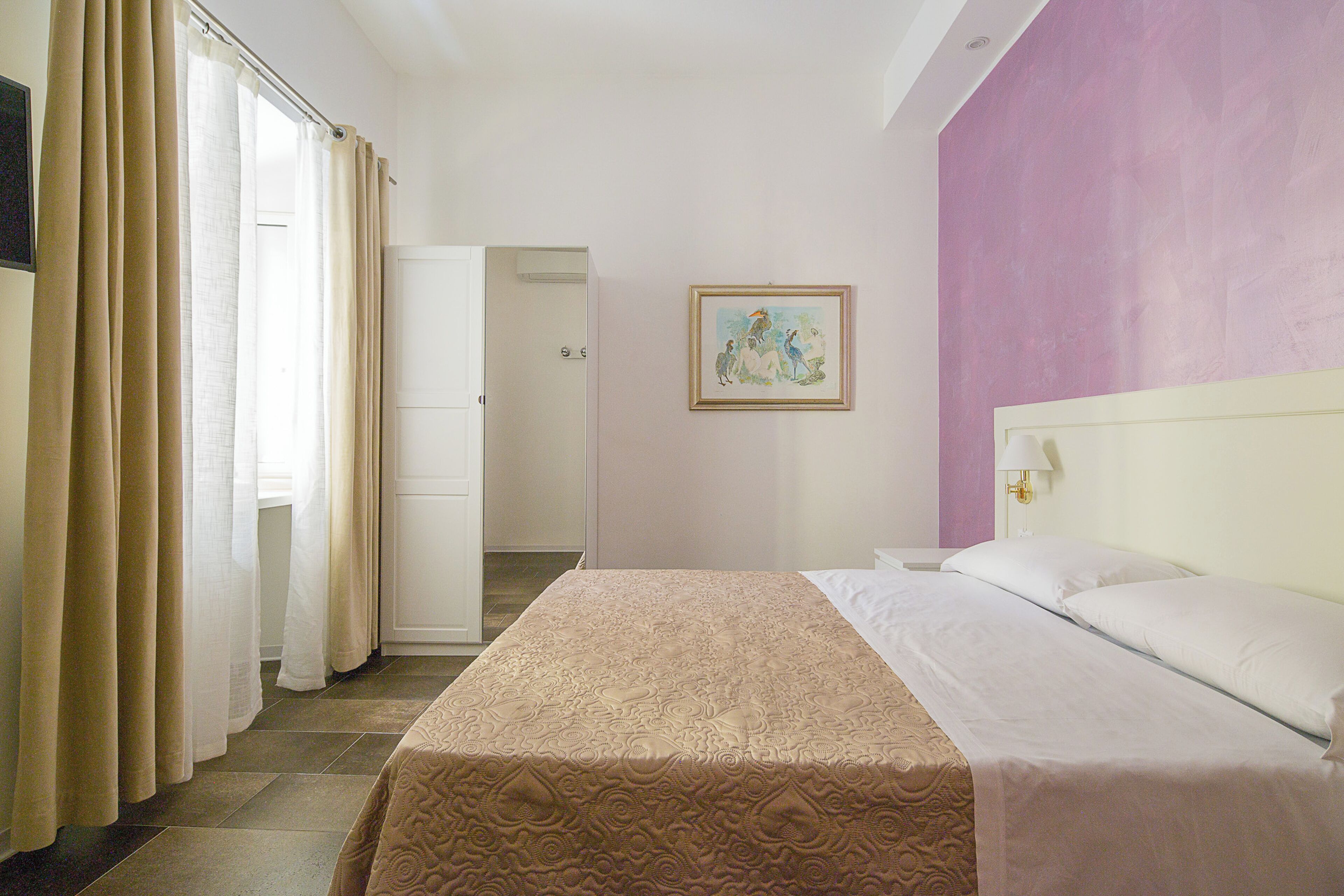 Free minibar, in-room safe, blackout curtains, iron/ironing board