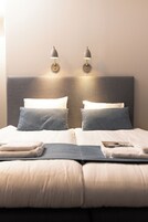 Habitación superior | Escritorio, espacio para trabajar con un portátil, cortinas opacas