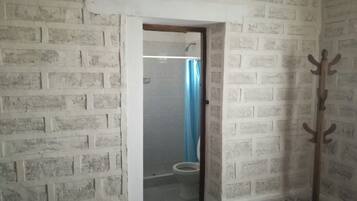 Double Room | Bathroom | Shower, free toiletries, towels