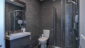 Shower, free toiletries, hair dryer, towels