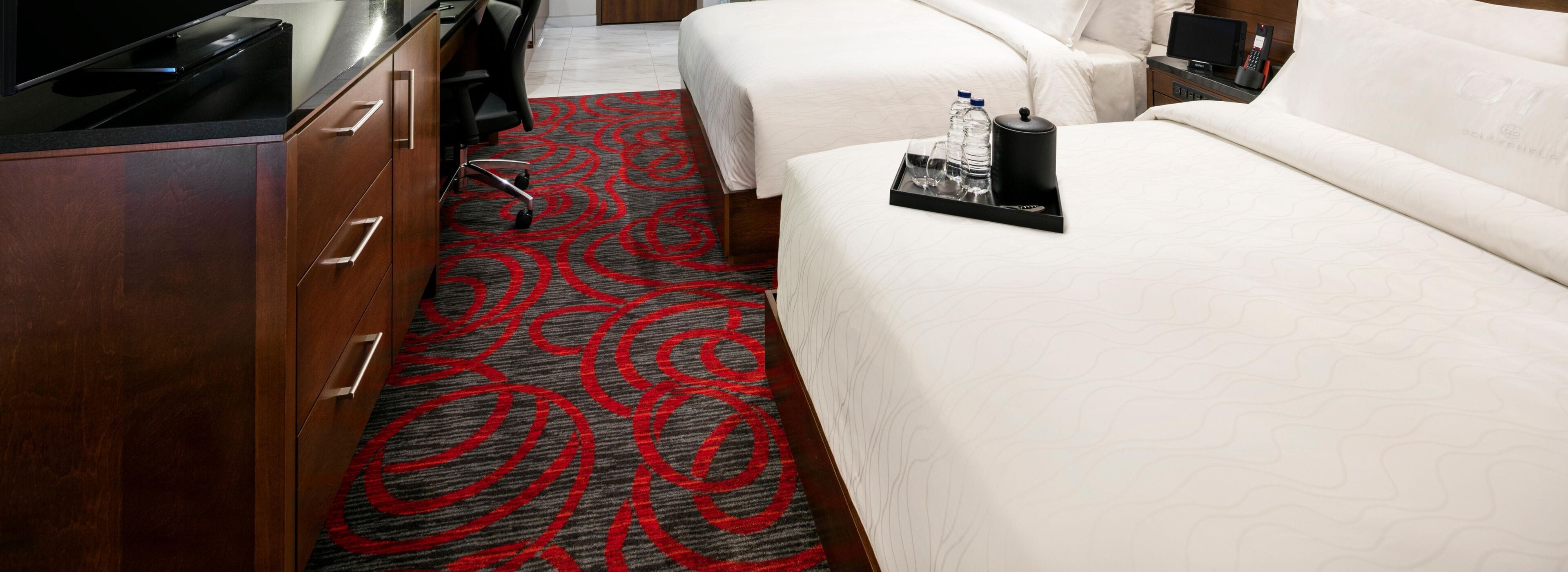 premium room, 2 queen beds | premium bedding, down duvets, memory-foam beds, in-room safe