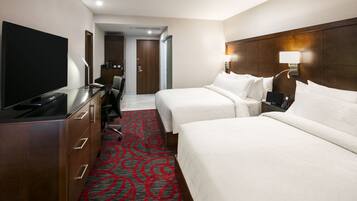 Premium bedding, down comforters, memory foam beds, in-room safe
