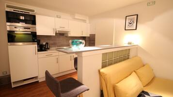 Apartment, 2 Bedrooms | Private kitchen | Full-sized fridge, oven, stovetop, electric kettle