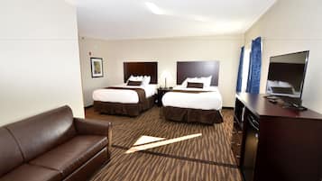 Deluxe suite | Luxe beddengoed, een bureau, een laptopwerkplek