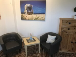 Double Room | Living area | Flat-screen TV