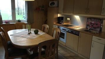 Bungalow, Terrace, Garden Area | Private kitchen | Fridge, microwave, oven, stovetop