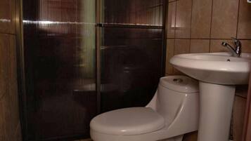 Basic House, 2 Bedrooms | Bathroom | Shower, free toiletries, towels