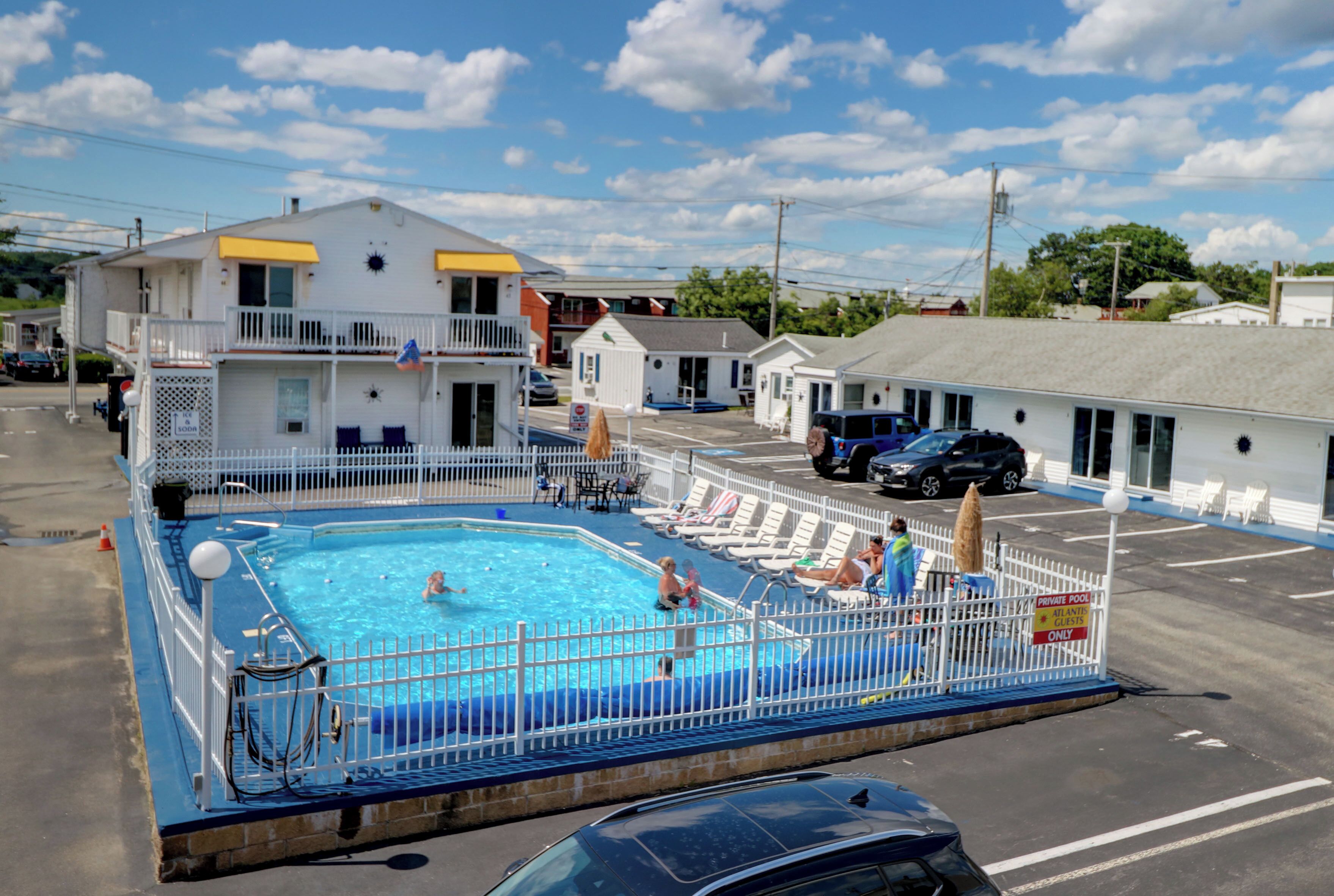 Outdoor pool, open 8:30 AM to 9:00 PM, pool umbrellas, pool loungers