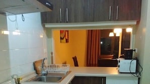 Standard House, 3 Bedrooms | Private kitchenette | Fridge, microwave, cookware/dishes/utensils - Casa Pucon Condominio Peumayen 2 (Pucón)