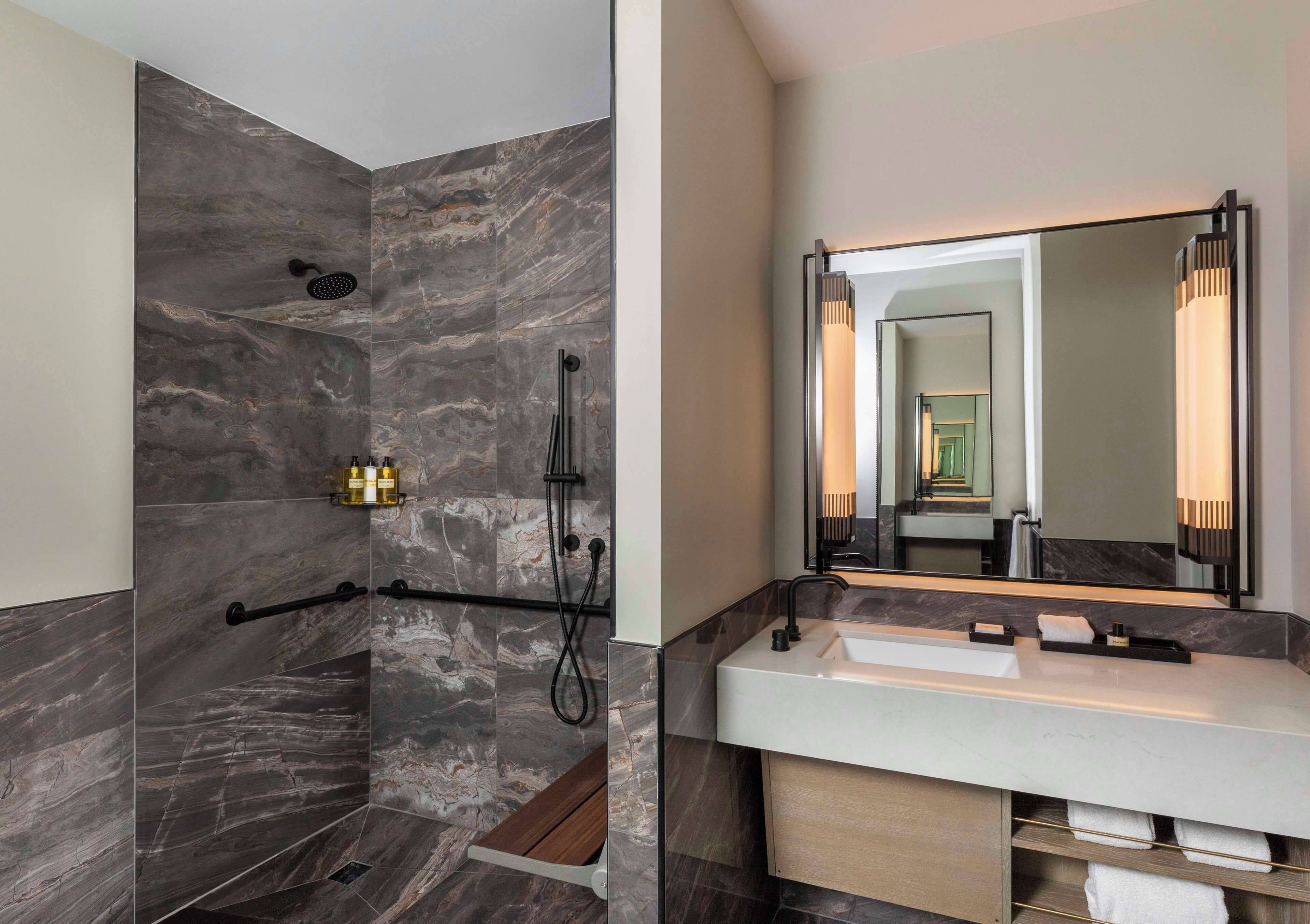 designer toiletries, hair dryer, bathrobes, towels