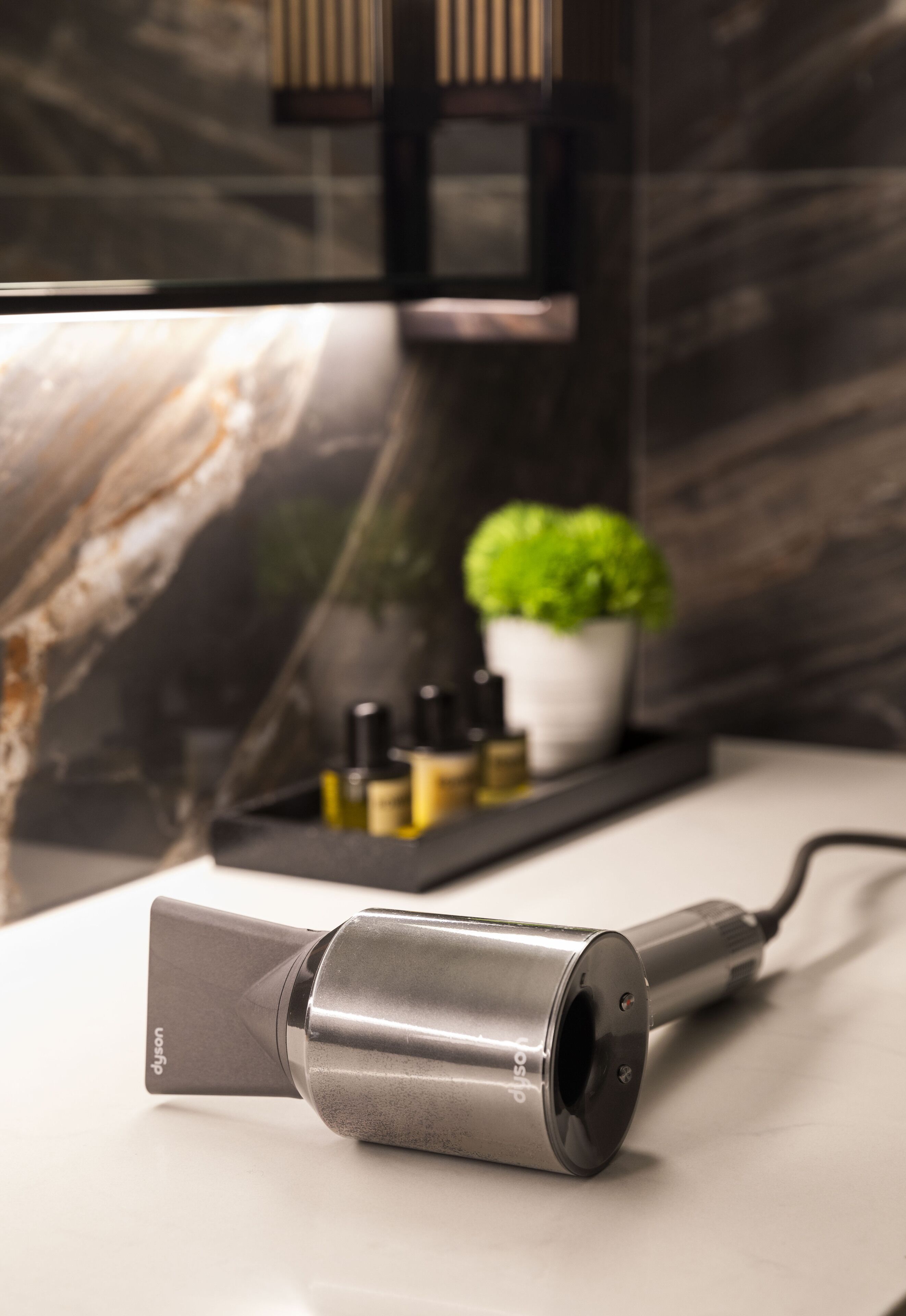 designer toiletries, hair dryer, bathrobes, towels