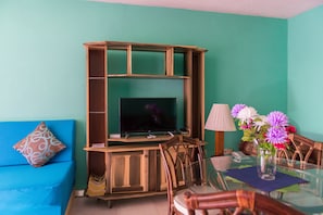 Deluxe Studio Suite, Beach View, Oceanfront | Living area | Flat-screen TV - Montego Bay Club Apartments (Montego Bay)