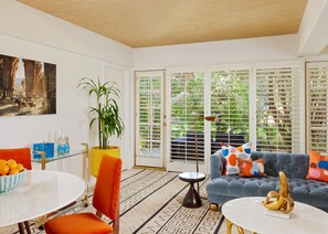 Suite (Garden) | Living area | 40-inch LCD TV with cable channels, TV