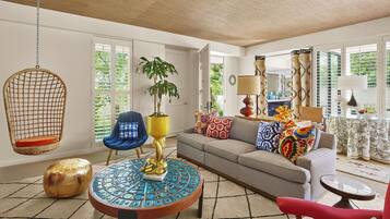 Villa | Living area | 40-inch LCD TV with cable channels, TV