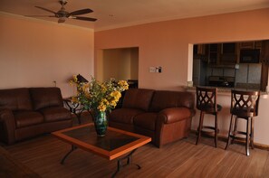 Flat-screen TV - Sun Rise Condos By The Vacation Casa (Tower Isle)