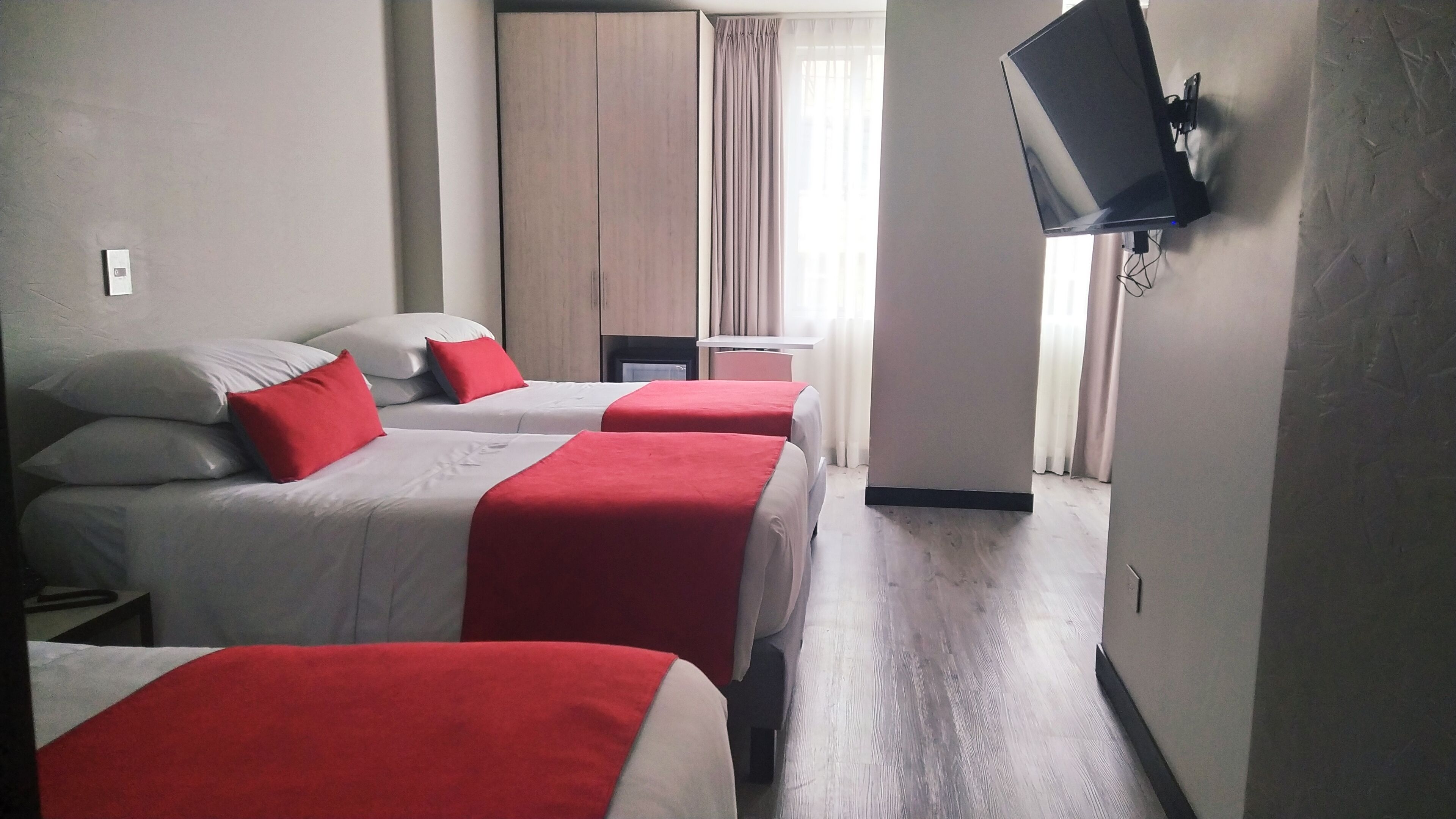 Minibar, in-room safe, blackout drapes, iron/ironing board - White Lighthouse Hotel (Bogota)