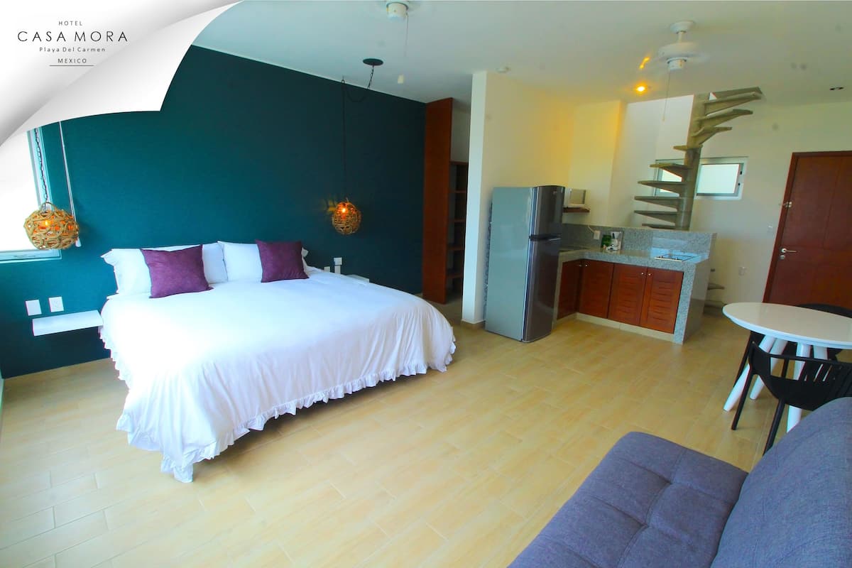 Suite Deluxe, Terraza | Ropa de cama de alta calidad y caja de seguridad en la habitación