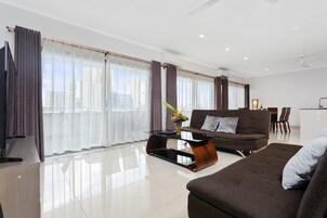 Executive Apartment | Living area | 43-cm LED TV with satellite channels, TV