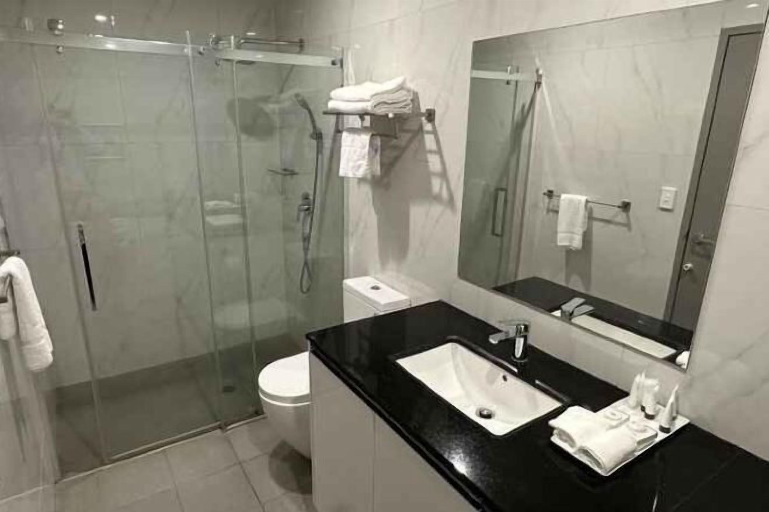 Shower, free toiletries, hair dryer, slippers