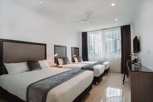 Family Room | Premium bedding, minibar, in-room safe, soundproofing