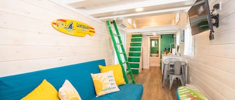 Cabin (Tiny House - Green Lifeguard Stand) | Living area | Flat-screen TV, Netflix, streaming services