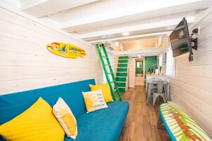Cabin (Tiny House - Green Lifeguard Stand) | Living area | Flat-screen TV, Netflix, streaming services
