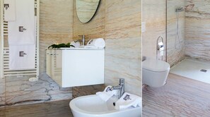 Combined shower/tub, hair dryer, bidet, towels