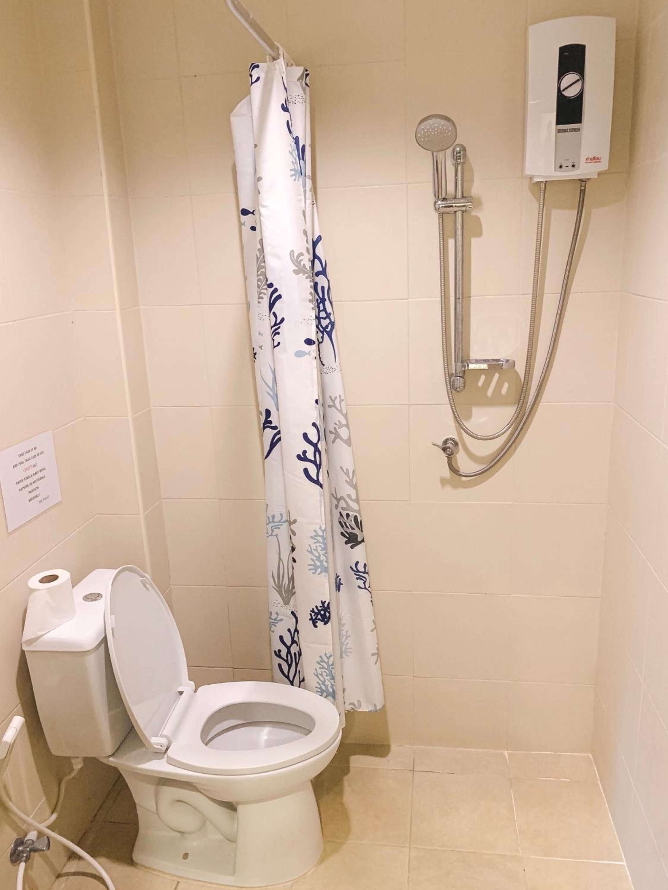 shower, free toiletries, bathrobes, slippers