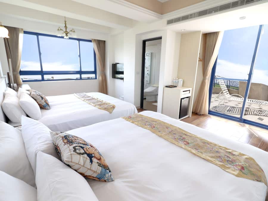 Deluxe Quadruple Room, Ocean View | Desk, blackout drapes, soundproofing, free WiFi