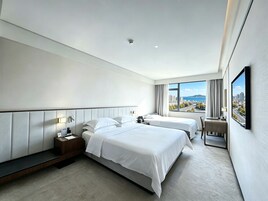 Sea View Family Room (1.8m King Bed + 1.4m Sofa Bed) | Minibar, in-room safe, blackout drapes, iron/ironing board