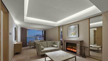 Deluxe Suite, 1 King Bed, Sea View | Minibar, in-room safe, desk, blackout curtains