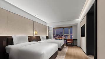 Deluxe-rum - 2 enkelsängar - havsutsikt | Minibar, värdeförvaringsskåp på rummet och skrivbord