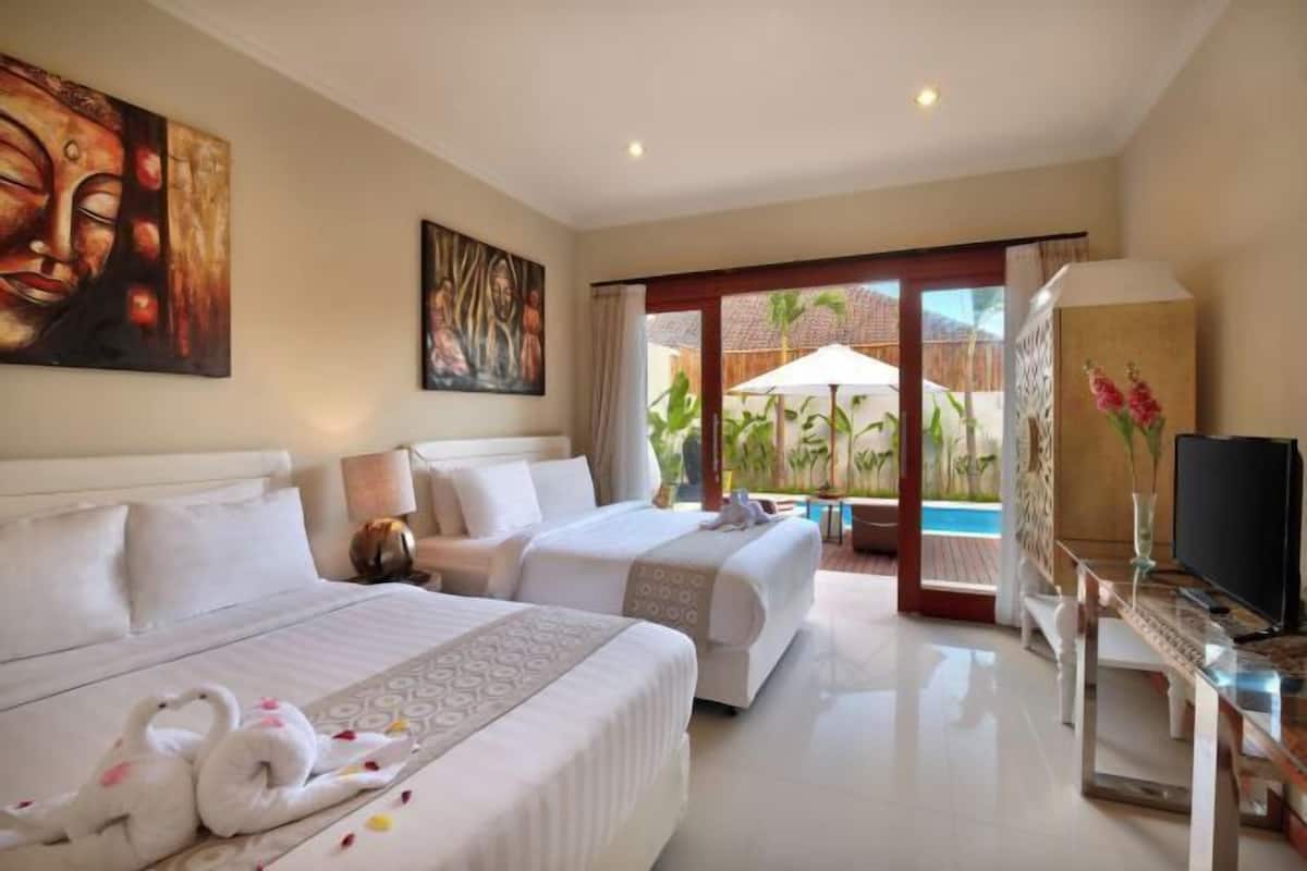 4 bedrooms, premium bedding, in-room safe, desk