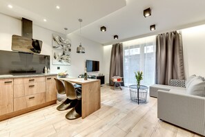 Comfort Apartment, 1 Bedroom, Terrace (with parking - 119) | Living area | Flat-screen TV - Apartinfo Angielska Grobla Apartments (Gdansk)