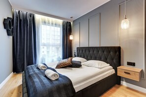 Apartemen Deluks, 1 kamar tidur, balkon (with parking - 128) | Setrika/meja setrika dan Wi-Fi gratis