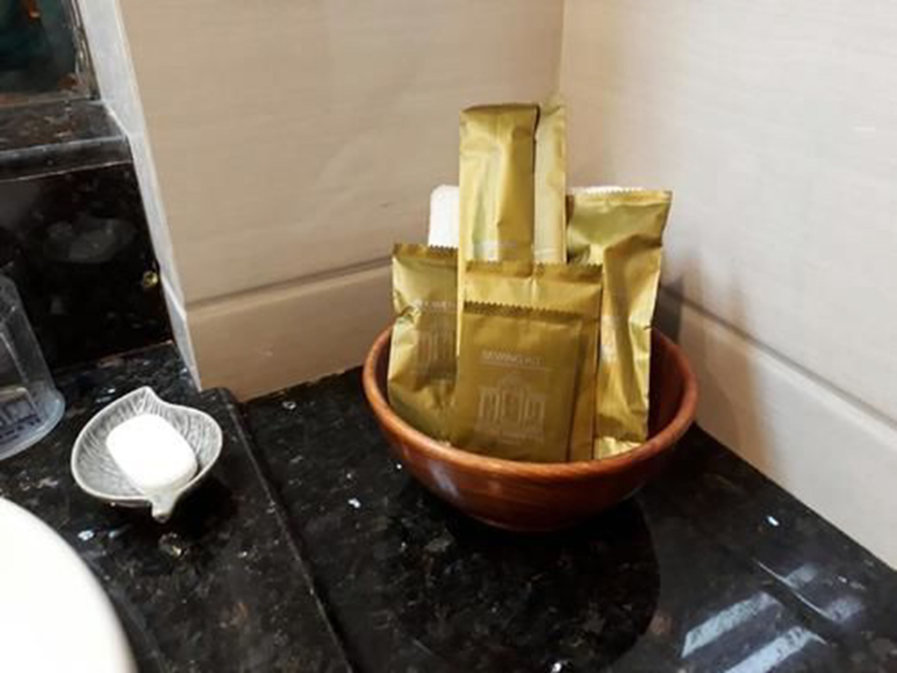 grand deluxe corner | bathroom amenities | free toiletries, hair dryer, slippers, towels