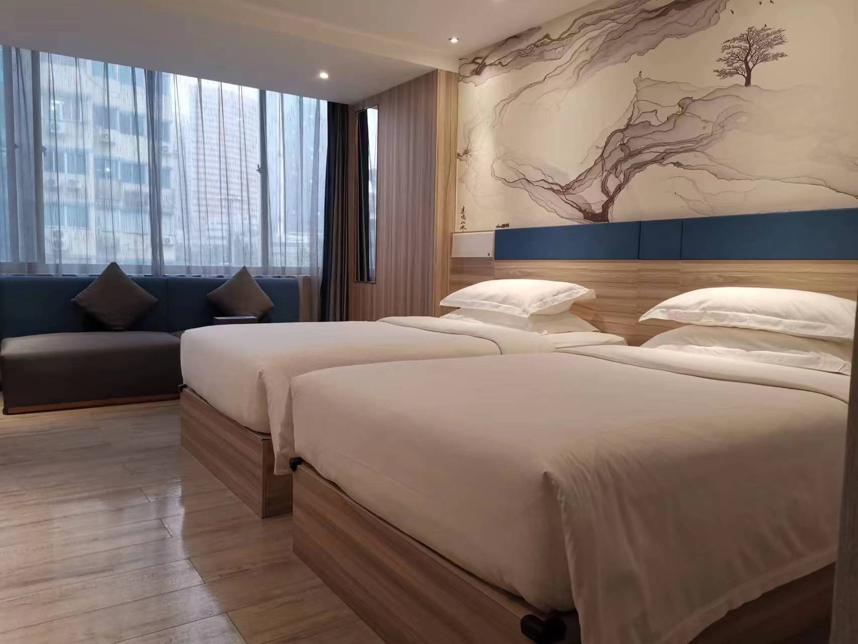 ビジネス ダブルルーム | 高級寝具、羽毛の掛け布団、低反発ベッド、デスク