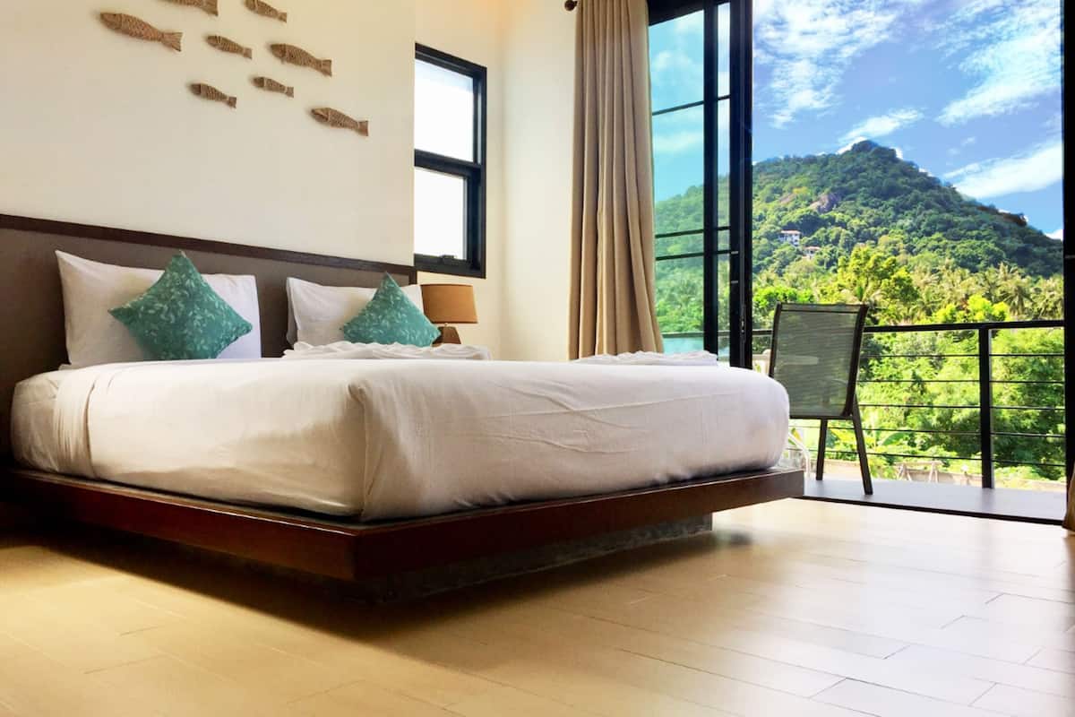 deluxe studio suite, 1 bedroom, non smoking, hill view | minibar, desk, blackout curtains, rollaway beds