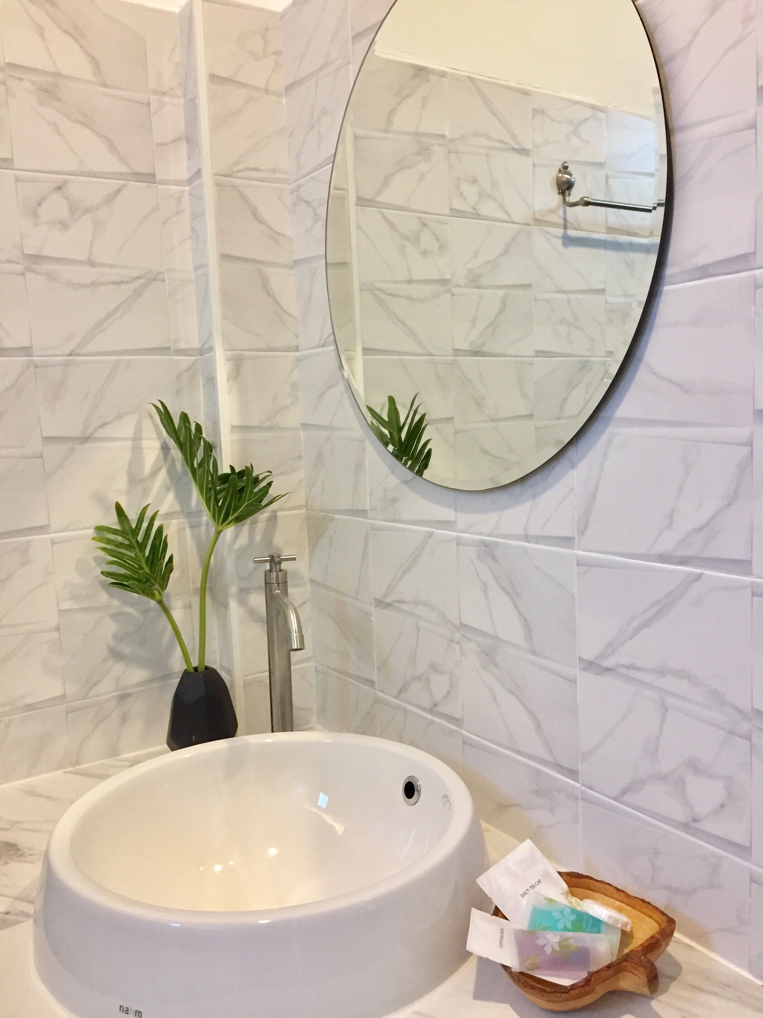 shower, free toiletries, slippers, towels