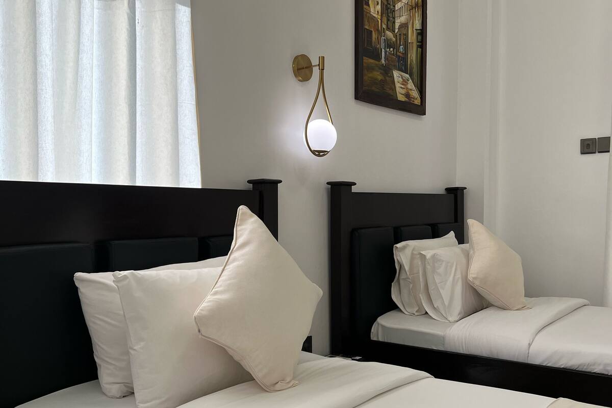 family room, city view | 1 bedroom, in-room safe, desk, soundproofing